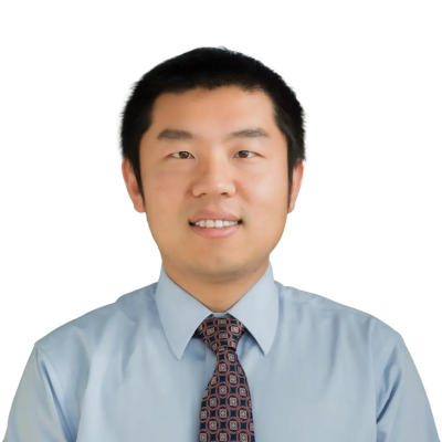 Asian man with black hair and wearing a tie