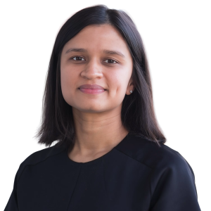 Middle eastern woman with medium length black hair wearing a black sweater.