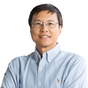 Asian man with black hair wearing glasses and a light blue button down shirt.